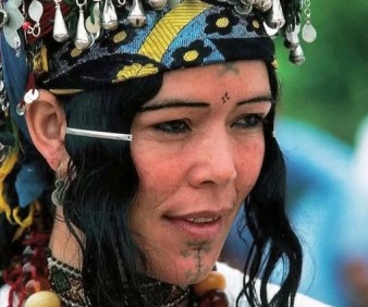 A berber lady from Ahouach dance in the High Atlas Mountains